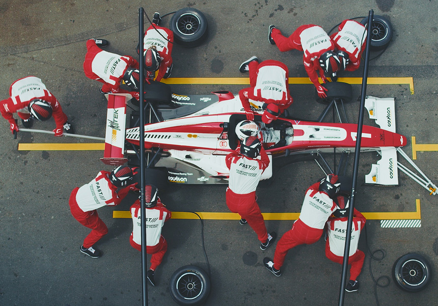 Race car driver, car and prep team