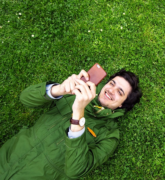 Young man using his mobile phone