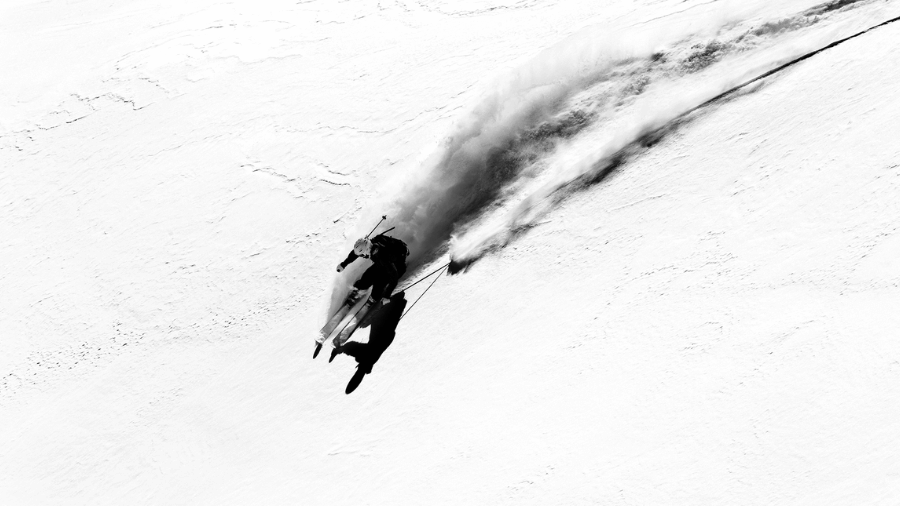 Woman skiing down a mountain